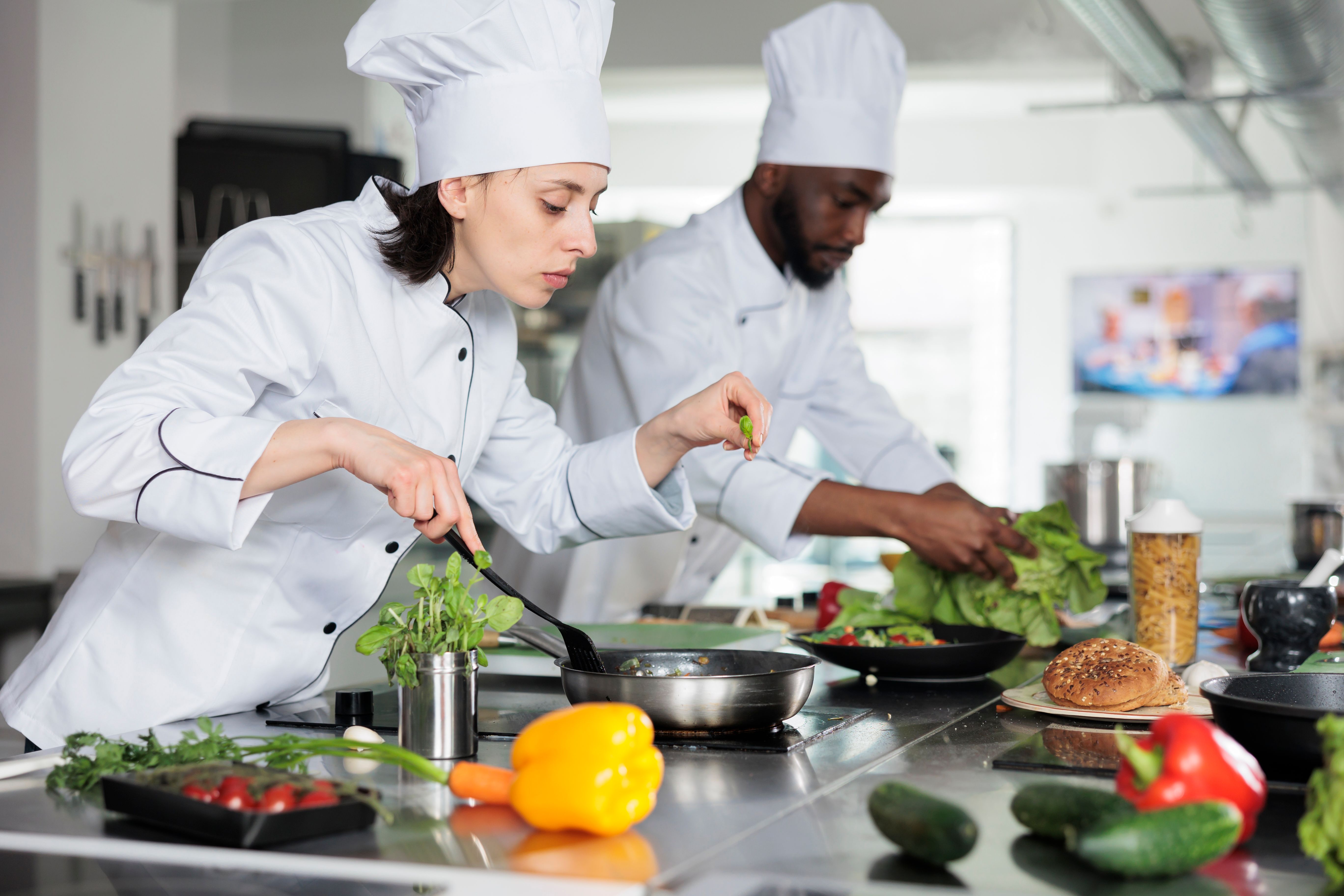 food-industry-worker-improving-gourmet-dish-taste-2022-08-14-00-58-46-utc.jpg